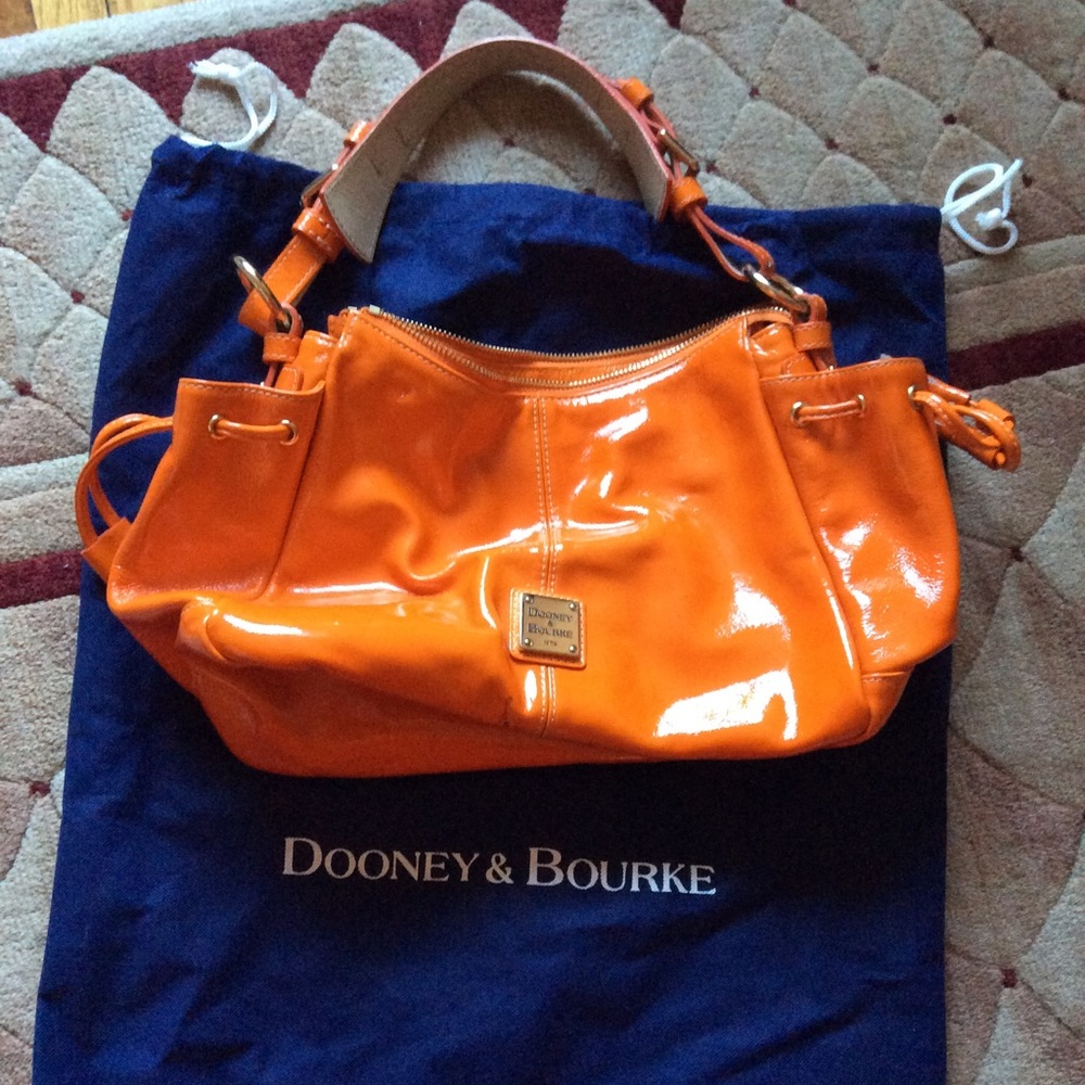 Dooney and Burke orange patent leather bag